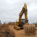 Backhoe digging at a construction site