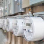 A row of electrical meters.